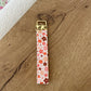 Keychain | Bracelet | Pink, orange and brown flowers