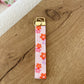 Keychain | Bracelet | Pink, orange and mauve flowers